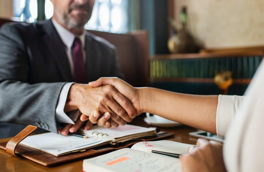 A professional consultation and handshake
